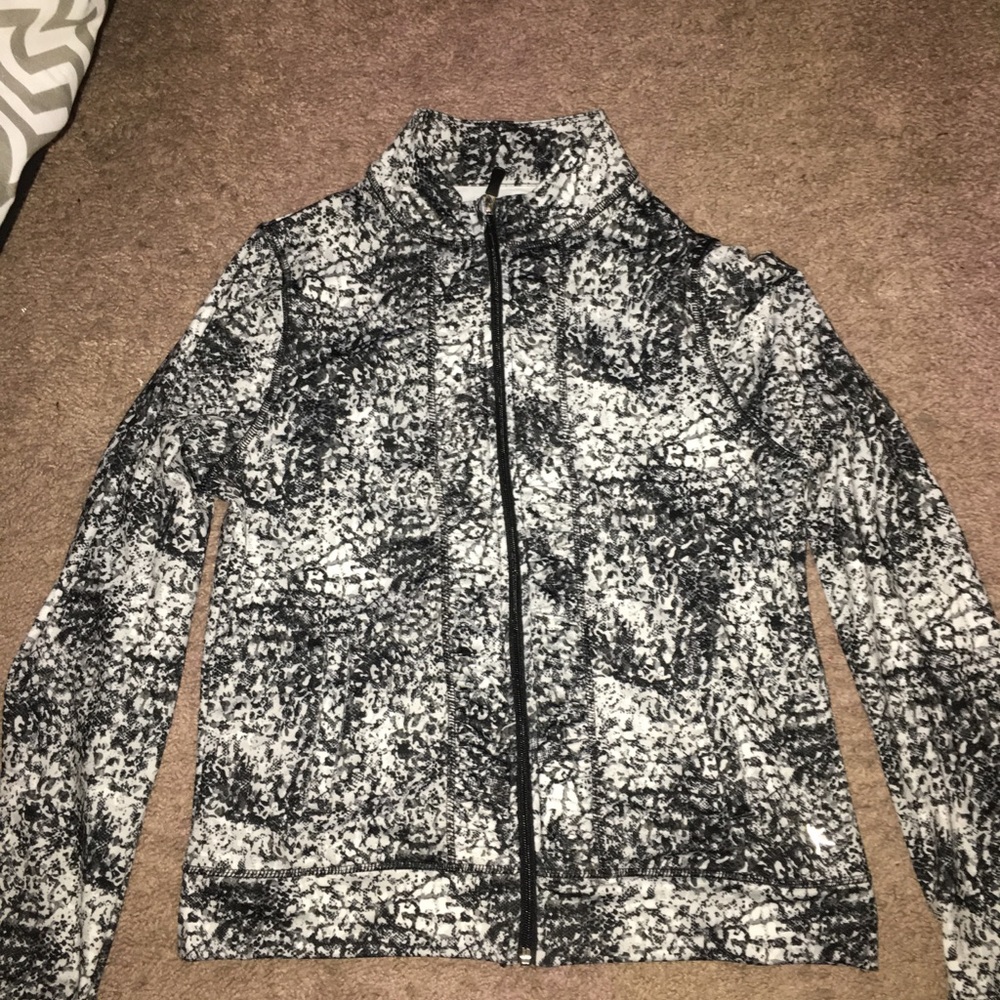 a black and white colored dry fit sweatshirt
